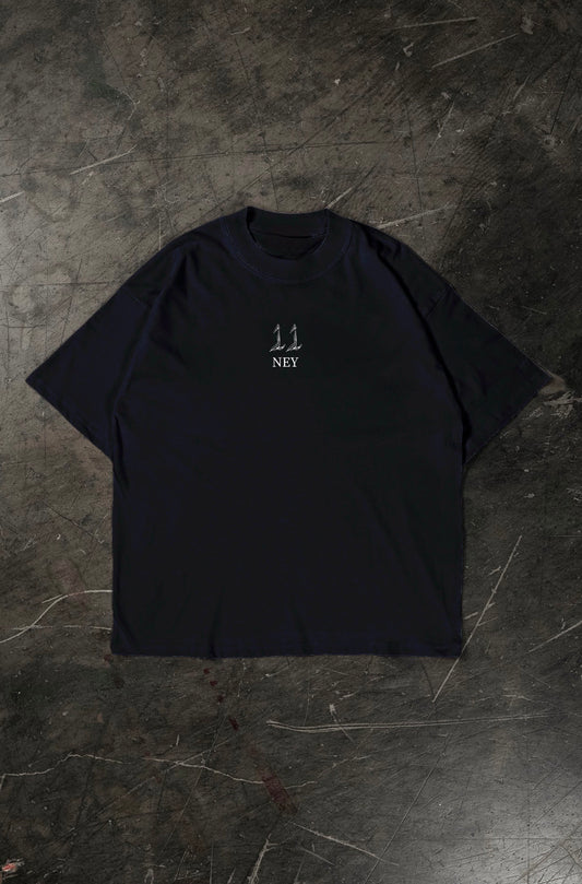 Black t-shirt with a Neymar JR on a textured dark surface