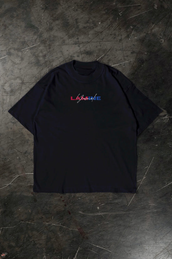 Black t-shirt with Lamine Yamal logo on a textured dark surface