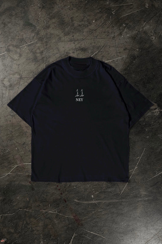 Black t-shirt with a Neymar JR logo on a textured dark surface