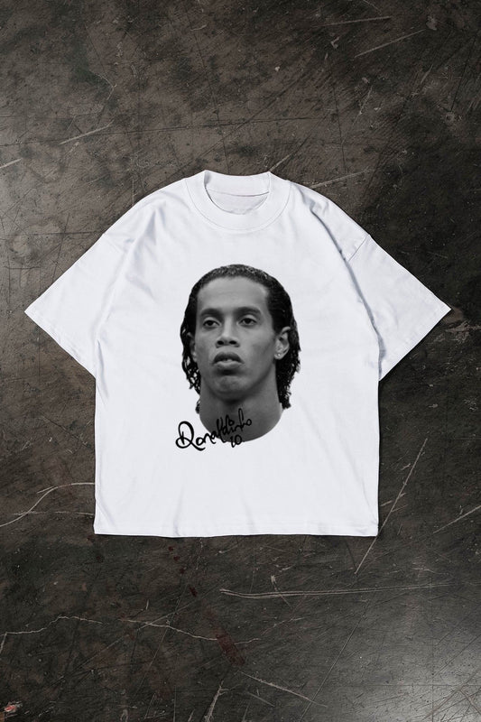 White t-shirt with a Ronaldinho on a textured dark surface